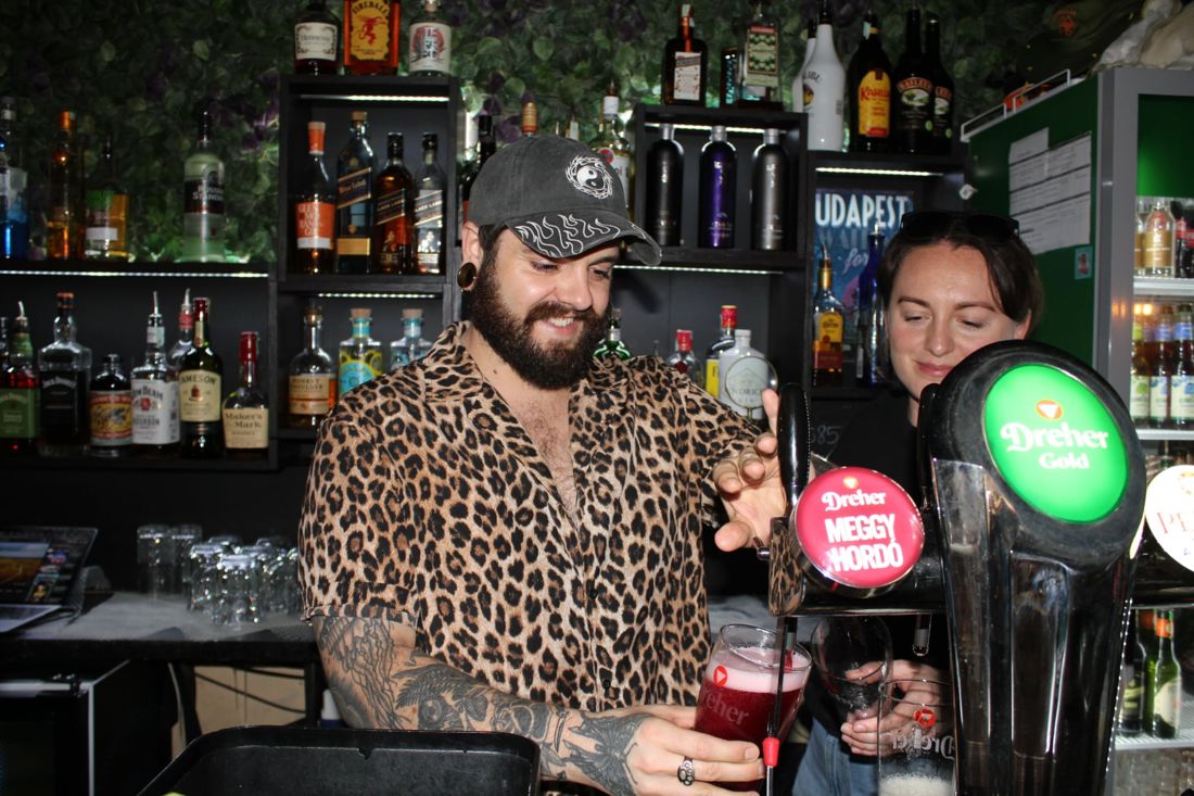 Bartender pouring a cherry beer